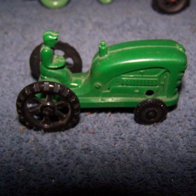 LOT 199 2 SMALL PLASTIC & 1 HARD RUBBER TRACTORS