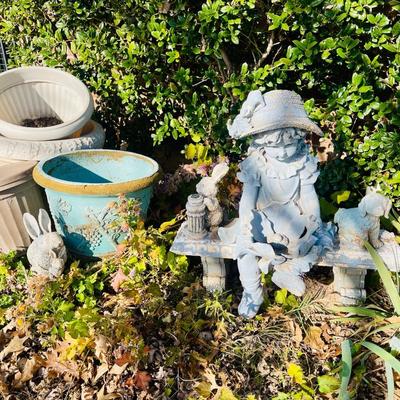 Girl on bench w/ friends lot