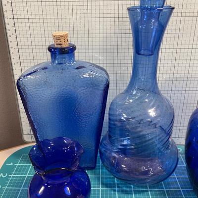 Large blue and clear glass vases