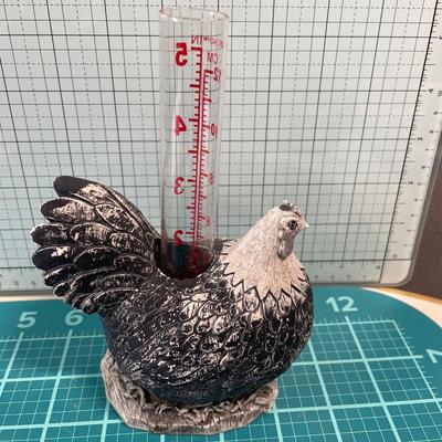Chicken rain gauge, Buffalo and bottle with wood cork