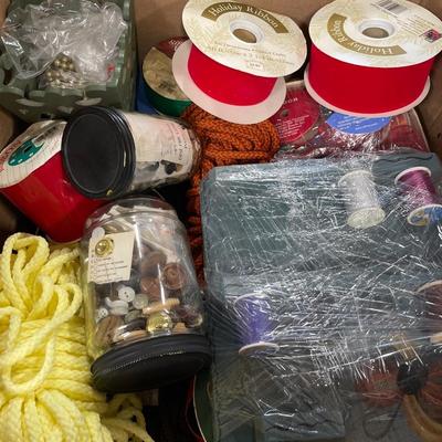 Box of ribbon, thread and buttons