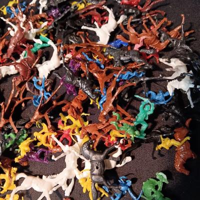 LARGE GROUP OF SMALL COWBOYS, INDIANS AND HORSES