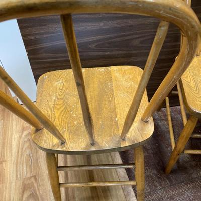 2 wood chairs without maker on bottom