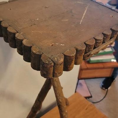 Side table made from tree limbs