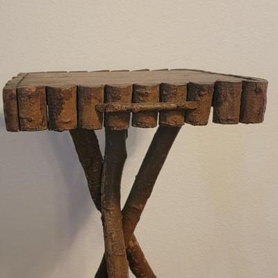 Side table made from tree limbs