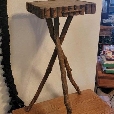 Side table made from tree limbs