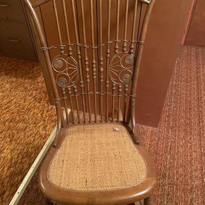 Wicker rocking chair with fun back