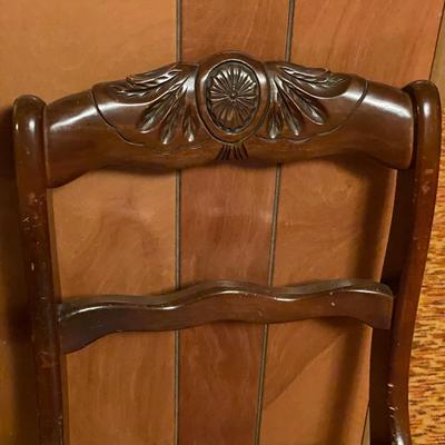 4 dark wood chairs