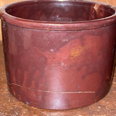 2 brown smaller crocks