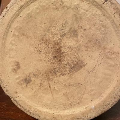 Stamped Minnesota jug with cork and unmarked jug with brown top