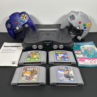 LOT 4L: Nintendo 64 Console w/ Controllers, Super Mario, Rugrats & More Games