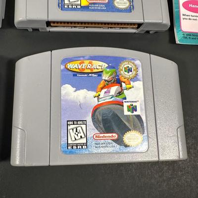 LOT 4L: Nintendo 64 Console w/ Controllers, Super Mario, Rugrats & More Games