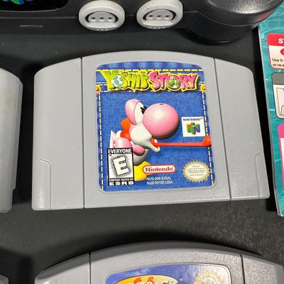 LOT 4L: Nintendo 64 Console w/ Controllers, Super Mario, Rugrats & More Games