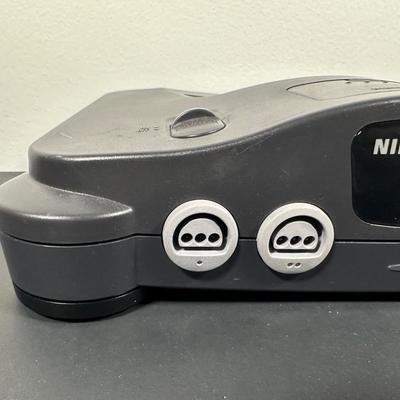 LOT 4L: Nintendo 64 Console w/ Controllers, Super Mario, Rugrats & More Games