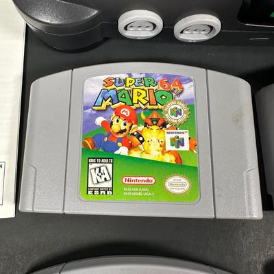 LOT 4L: Nintendo 64 Console w/ Controllers, Super Mario, Rugrats & More Games