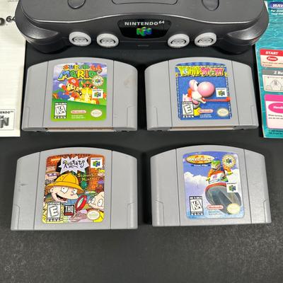 LOT 4L: Nintendo 64 Console w/ Controllers, Super Mario, Rugrats & More Games