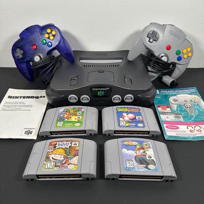 LOT 4L: Nintendo 64 Console w/ Controllers, Super Mario, Rugrats & More Games