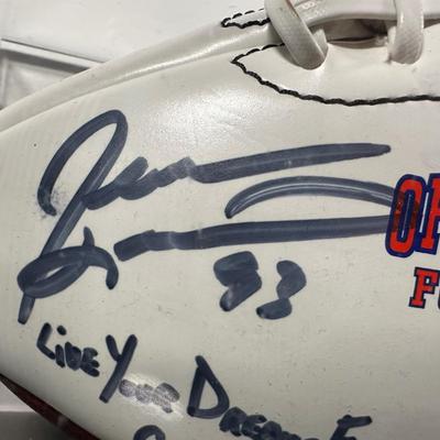 LOT 10L: Football Signed by Ray Isaac, Maxie Baughan, Jevon Kearse & More