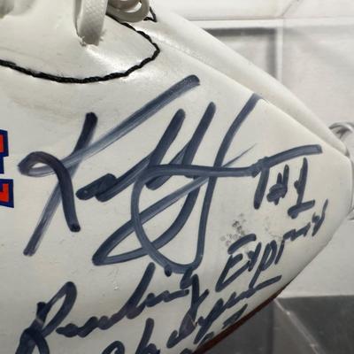 LOT 10L: Football Signed by Ray Isaac, Maxie Baughan, Jevon Kearse & More