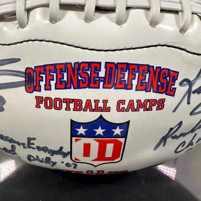 LOT 10L: Football Signed by Ray Isaac, Maxie Baughan, Jevon Kearse & More