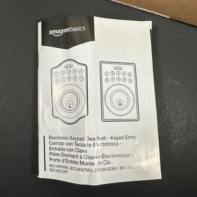 LOT 13L: 2 Chicago Electric Solar Shed Lights & 2 Amazon Basics Electric Keypad Deadbolts - NIP