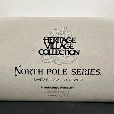 LOT 17L: Four Department 56 The Heritage Village Collection North Pole Series Porcelain Houses