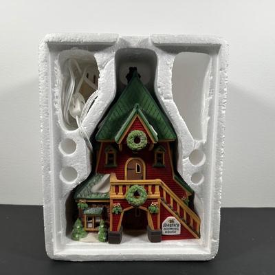 LOT 17L: Four Department 56 The Heritage Village Collection North Pole Series Porcelain Houses