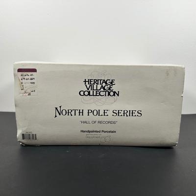 LOT 17L: Four Department 56 The Heritage Village Collection North Pole Series Porcelain Houses