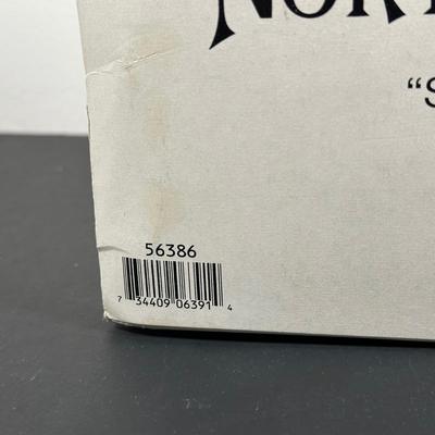 LOT 17L: Four Department 56 The Heritage Village Collection North Pole Series Porcelain Houses