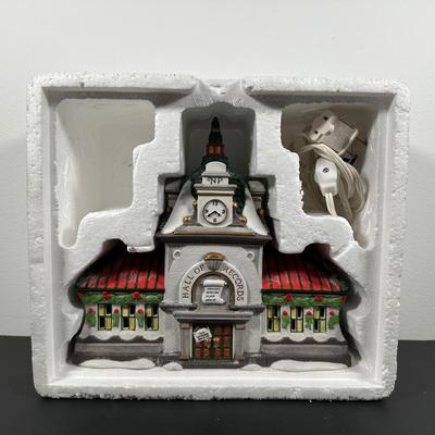 LOT 17L: Four Department 56 The Heritage Village Collection North Pole Series Porcelain Houses