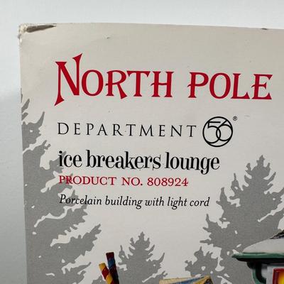 LOT 18L: Department 56 The Heritage Village Collection North Pole Series Porcelain Houses