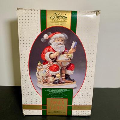 LOT 20 L: "Animated & Illuminated Deluxe Special People" by Design Arts, "Rock Santa" Edition #1, & 1990...