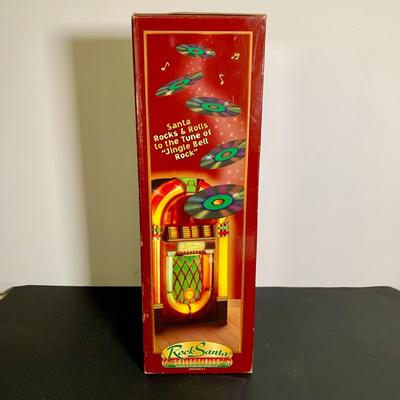 LOT 20 L: "Animated & Illuminated Deluxe Special People" by Design Arts, "Rock Santa" Edition #1, & 1990...