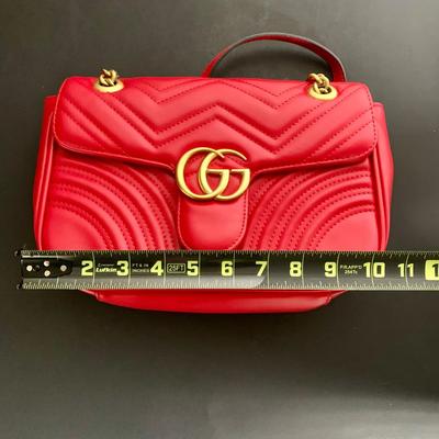 LOT 21 L: Gucci Red Marmont Matelase Shoulder Bag in Hibiscus Red Calfskin Leather w/ Suede Interior