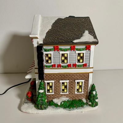 LOT 25 L: St. Nicholas Square Illuminated 2009 "Ryan's Bicycle Shop", 2010 "The Coffee Grounds", Department 56...