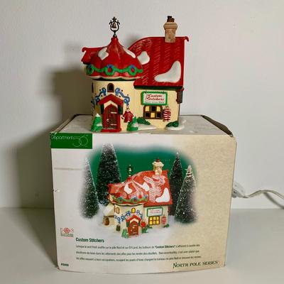 LOT 25 L: St. Nicholas Square Illuminated 2009 "Ryan's Bicycle Shop", 2010 "The Coffee Grounds", Department 56...