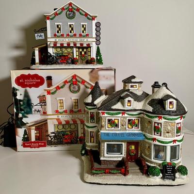 LOT 25 L: St. Nicholas Square Illuminated 2009 "Ryan's Bicycle Shop", 2010 "The Coffee Grounds", Department 56...