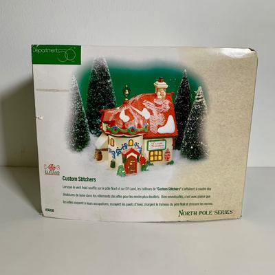 LOT 25 L: St. Nicholas Square Illuminated 2009 "Ryan's Bicycle Shop", 2010 "The Coffee Grounds", Department 56...