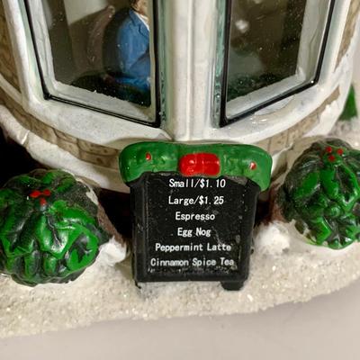 LOT 25 L: St. Nicholas Square Illuminated 2009 "Ryan's Bicycle Shop", 2010 "The Coffee Grounds", Department 56...