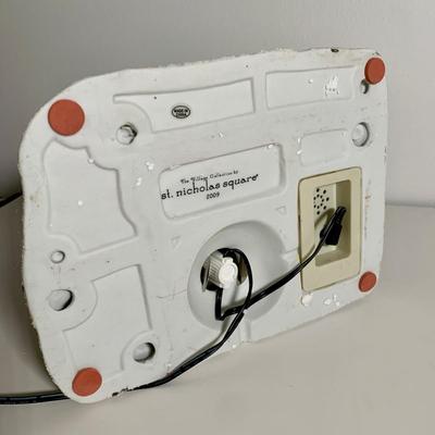 LOT 25 L: St. Nicholas Square Illuminated 2009 "Ryan's Bicycle Shop", 2010 "The Coffee Grounds", Department 56...