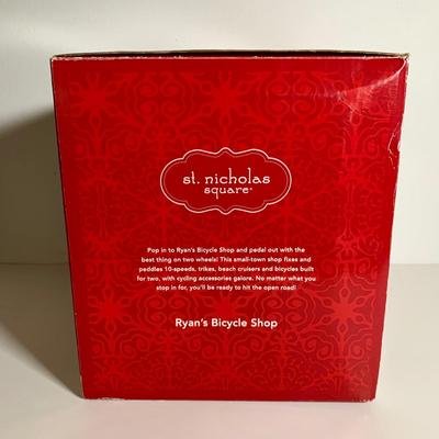 LOT 25 L: St. Nicholas Square Illuminated 2009 "Ryan's Bicycle Shop", 2010 "The Coffee Grounds", Department 56...