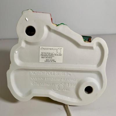 LOT 25 L: St. Nicholas Square Illuminated 2009 "Ryan's Bicycle Shop", 2010 "The Coffee Grounds", Department 56...