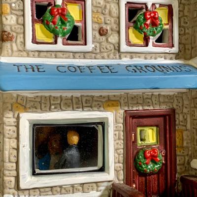 LOT 25 L: St. Nicholas Square Illuminated 2009 "Ryan's Bicycle Shop", 2010 "The Coffee Grounds", Department 56...