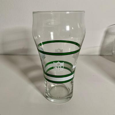LOT 38 L: NFL Philadelphia Eagles Collection: Glass & Plastic Drinking Glasses, Hand Painted Sugar Skull, Glitter Lamp, & More