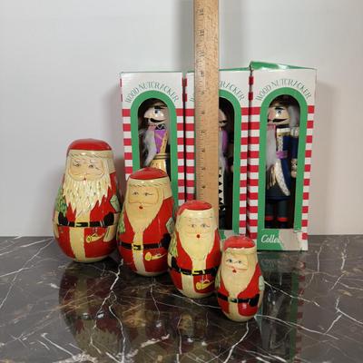 LOT 46D: Vintage Santa Nesting Dolls & Three Wooden Nutcrackers w/ Boxes