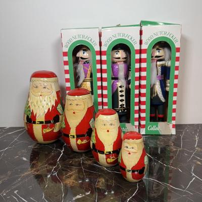 LOT 46D: Vintage Santa Nesting Dolls & Three Wooden Nutcrackers w/ Boxes