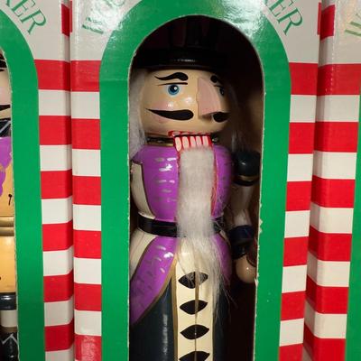 LOT 46D: Vintage Santa Nesting Dolls & Three Wooden Nutcrackers w/ Boxes