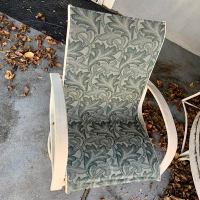 LOT 129 O: Large Outdoor Green Leaf Motif Patio Set: Glass Top Table w/ 6 Chairs, 2 Glass Top Side Tables w/ Glider, Lounger, & Ottoman