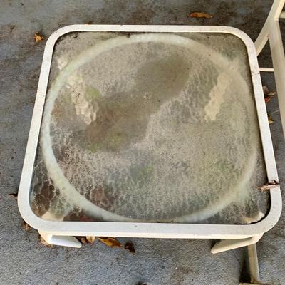 LOT 129 O: Large Outdoor Green Leaf Motif Patio Set: Glass Top Table w/ 6 Chairs, 2 Glass Top Side Tables w/ Glider, Lounger, & Ottoman