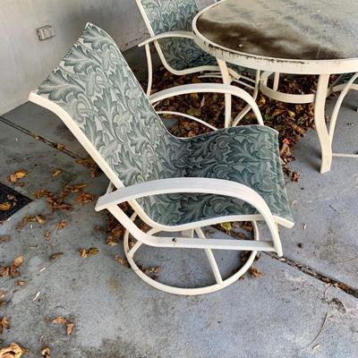 LOT 129 O: Large Outdoor Green Leaf Motif Patio Set: Glass Top Table w/ 6 Chairs, 2 Glass Top Side Tables w/ Glider, Lounger, & Ottoman